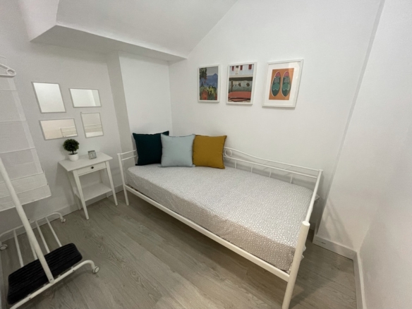 08-DORMITORIO2-584x438